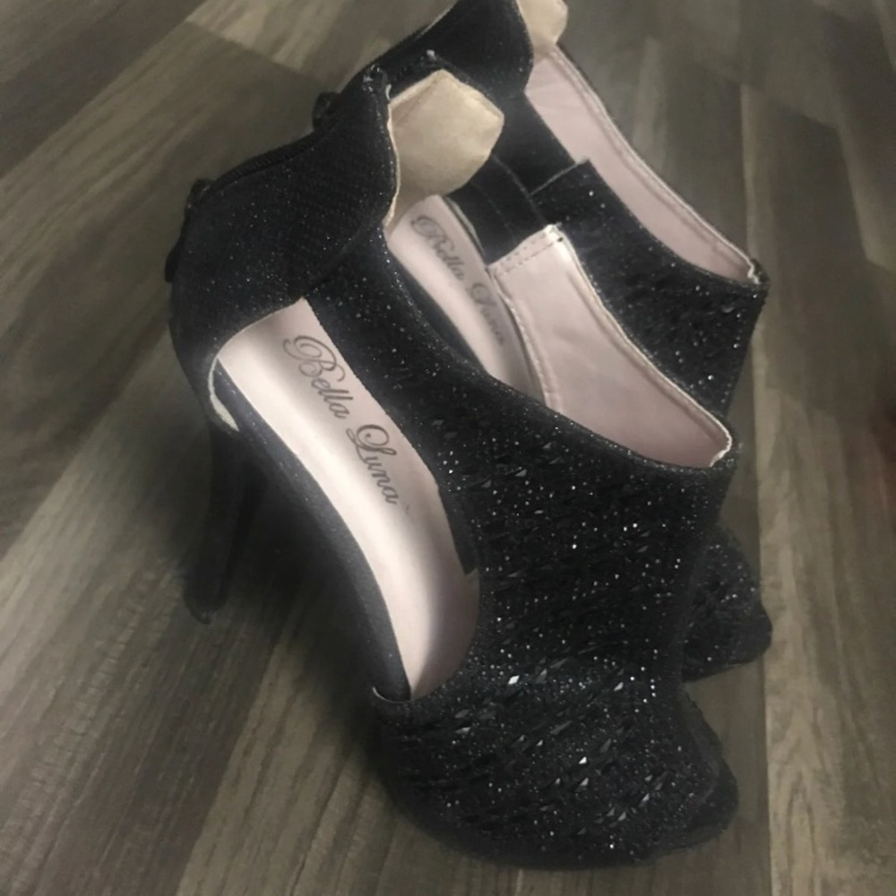 Women’s never worn heels. Black with rhinestones.